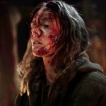 Actress Samara Weaving, covered in blood in "Azrael."